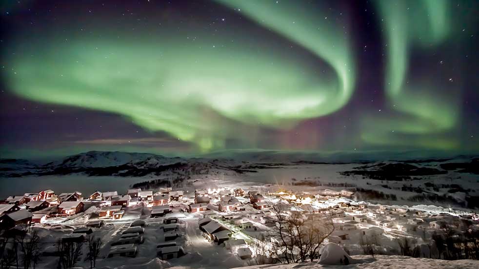 Winter experiences snowy village aurora